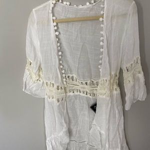 White beach cover up